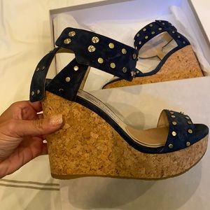 Jimmy Choo blue wedge with grommet details women’s size 39.